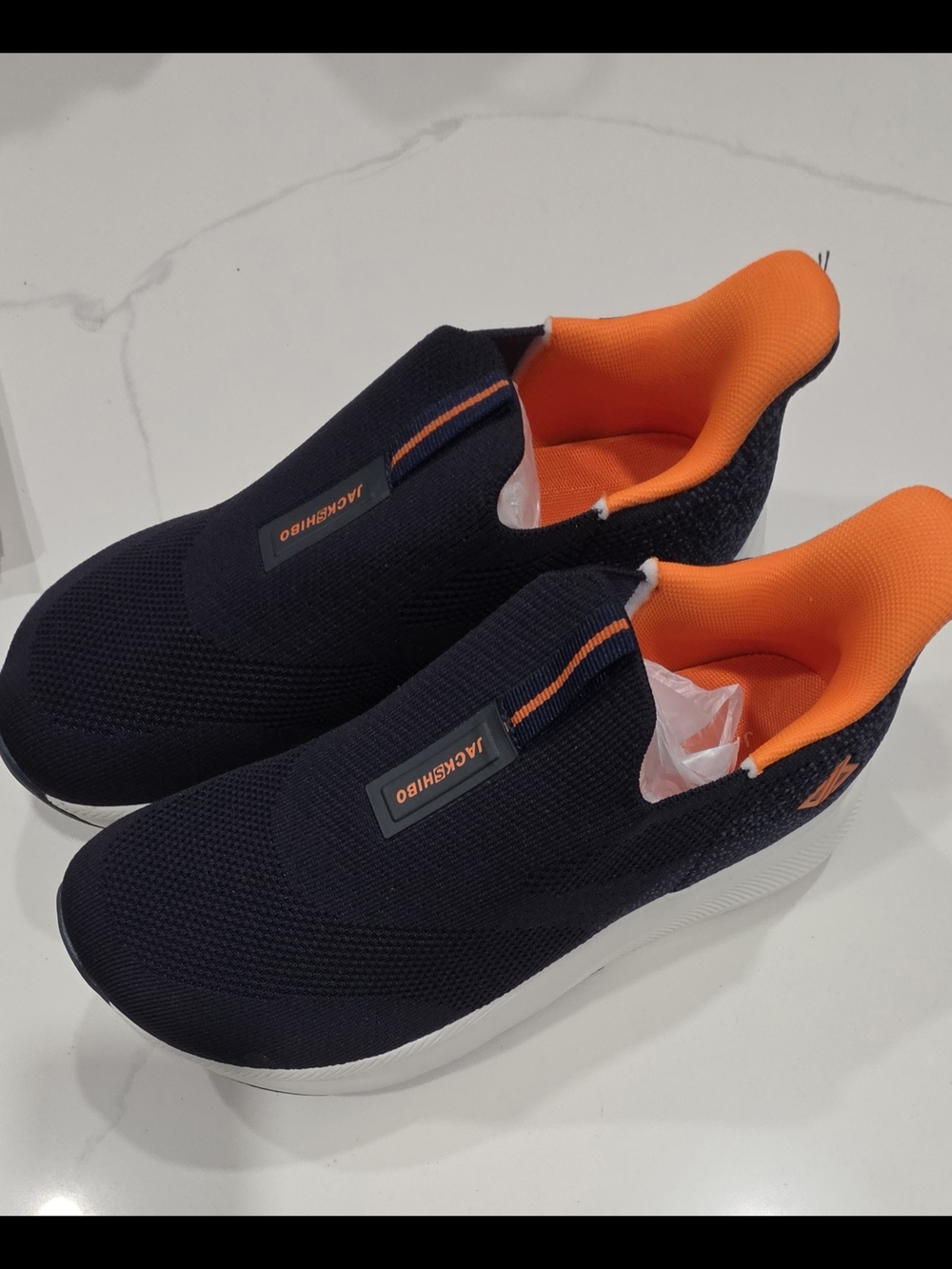 Men's Jackshibo Slip-On Knit Sneaker in Black and Orange
